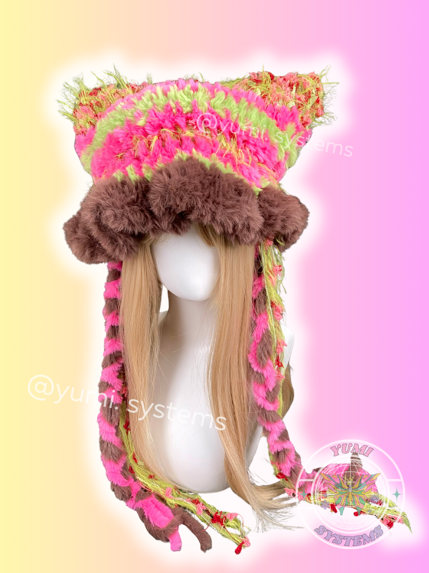 Hand-knitted neon pink and green plush hat with detachable bear ears, artisan craft by yumi.systems.
