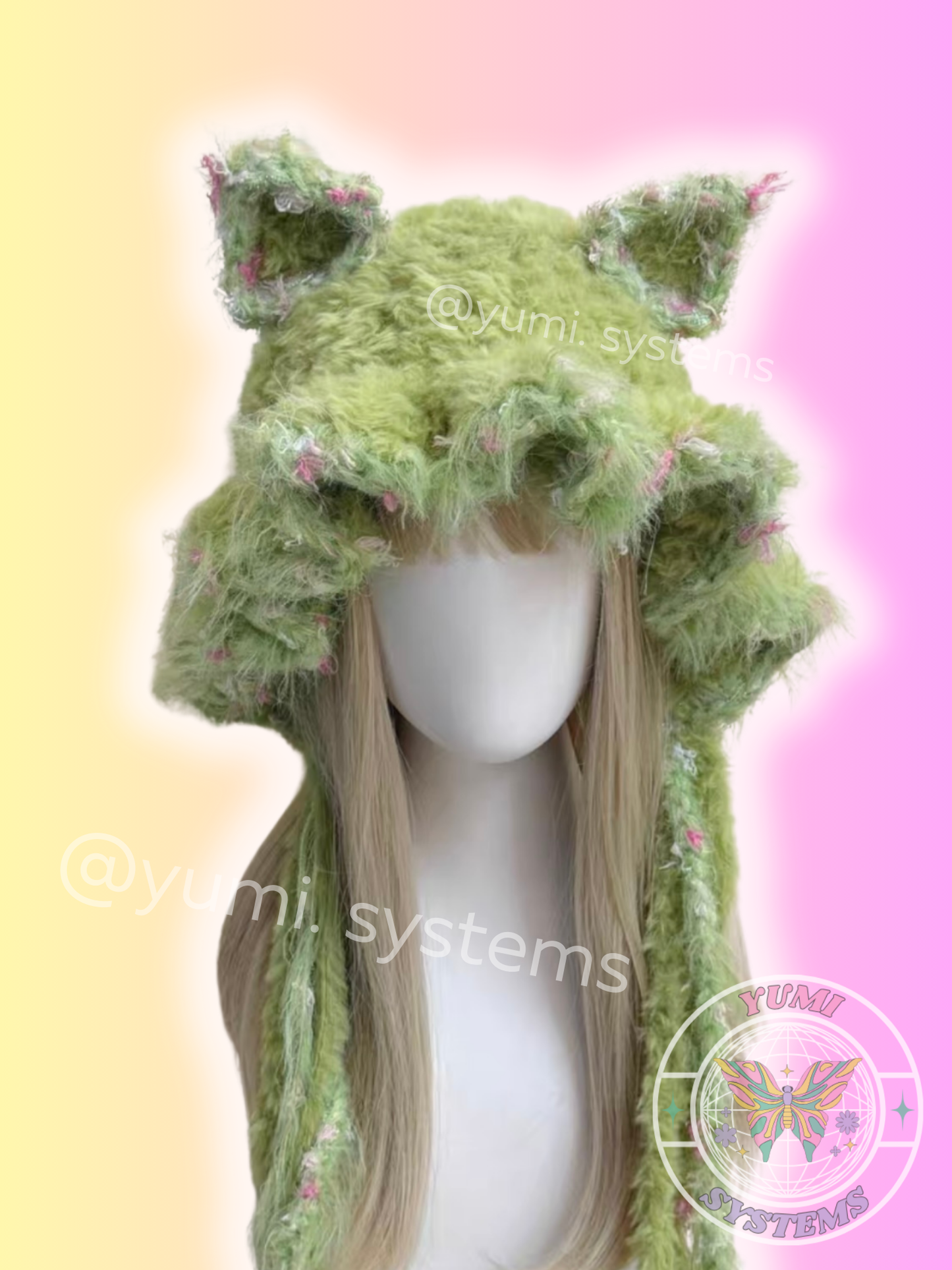 Close-up of a thick, colorful handmade animal ear hat with long tassels on a mannequin.