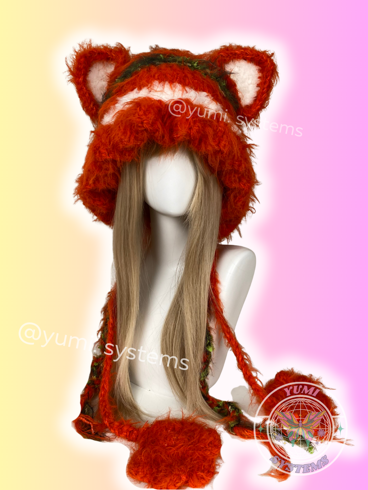 Thick hand-knit shaggy trapper hat with detachable animal ears in flame orange and earthy brown colors by YUMI SYSTEMS.